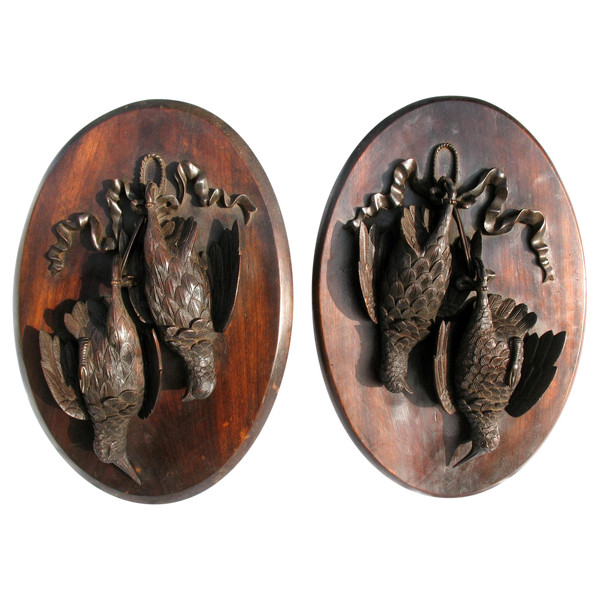 Pair of hunting trophies in carved wood from the Black Forest, 19th century