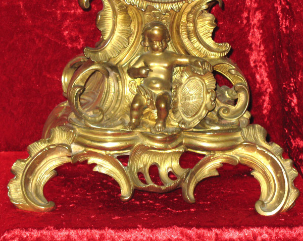 Cartel in bronze 19th century Rocaille style with cherub