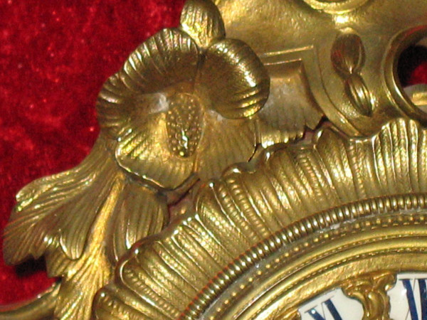 Cartel in bronze 19th century Rocaille style with cherub