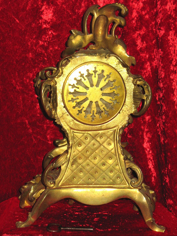 Cartel in bronze 19th century Rocaille style with cherub