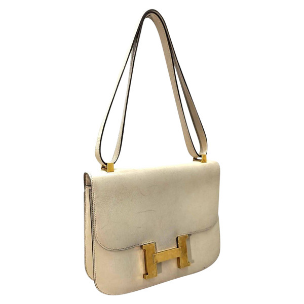 Hermès Damenhandtasche aus cremefarbenem Leder, Modell Constance