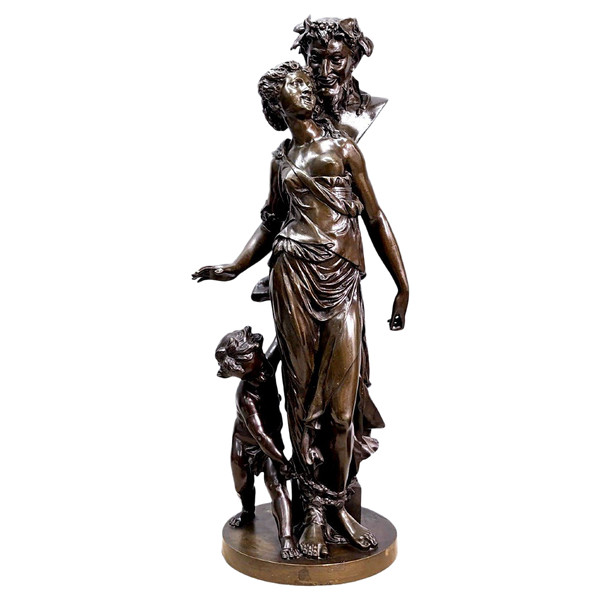 Gruppo in bronzo di giovane ragazza e satiro di Clodion (1738-1814) Scultura in bronzo con patina marrone