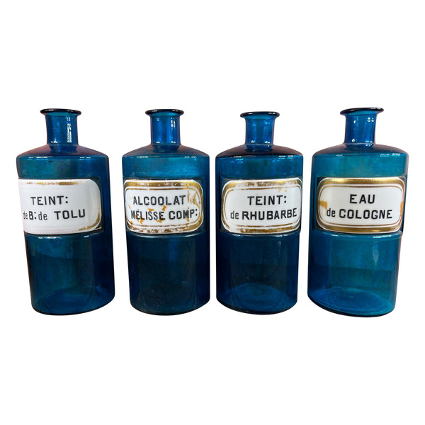 Set mit 4 alten blauen Apothekenflaschen um 1860
