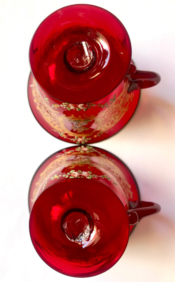 Pair of cups and saucers in ruby red enamelled Venetian glass