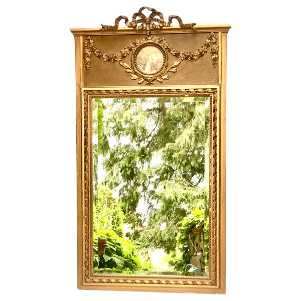 Louis XVI style gilt trumeau mirror