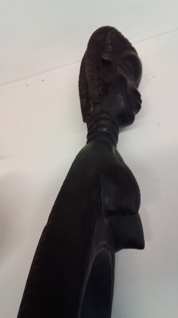 Cucchiaio cerimoniale Wakémia decorato con una testa di donna liberiana