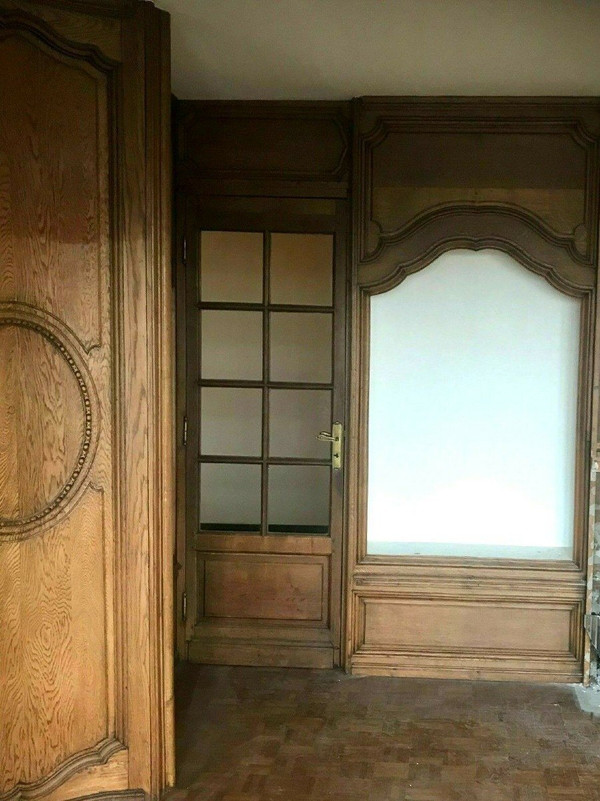 Boiserie in stile Luigi XV in massello di rovere del XX secolo