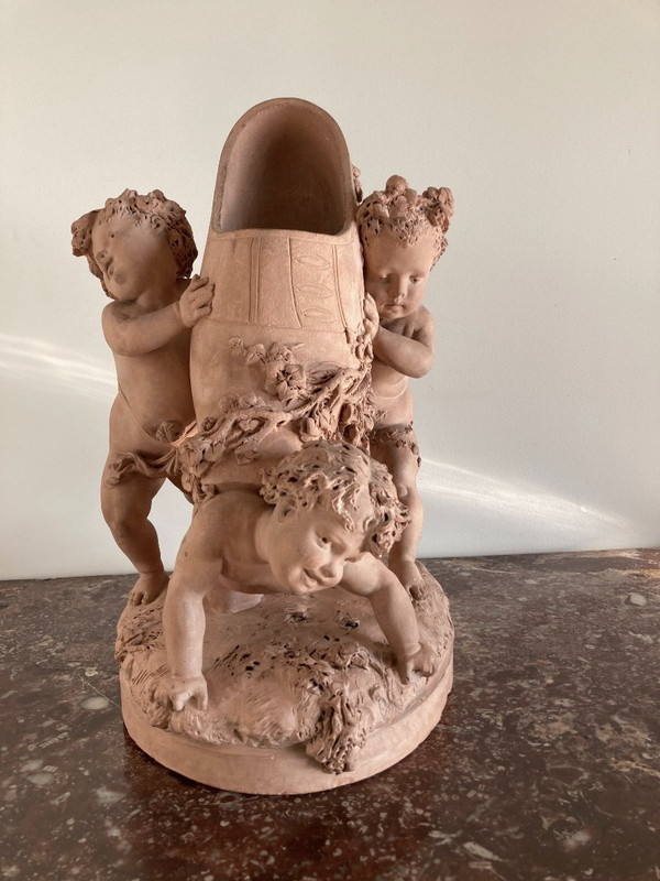Terracotta di Luca Madrassi (1848-1919) - Allegoria con fiori e putti