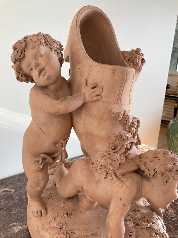 Terracotta di Luca Madrassi (1848-1919) - Allegoria con fiori e putti