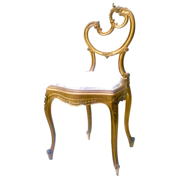 Louis XV Rocaille style chair in gilded wood