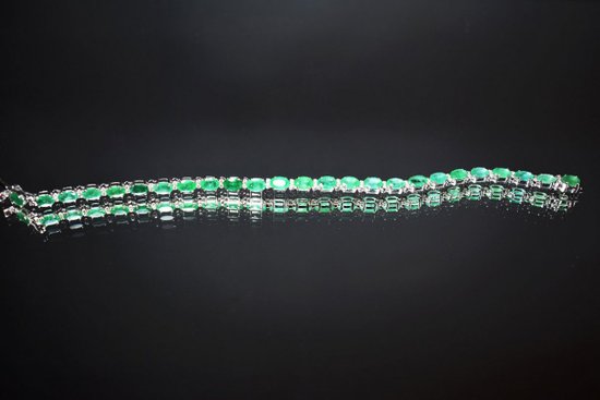 Bracciale in oro con smeraldi e diamanti
