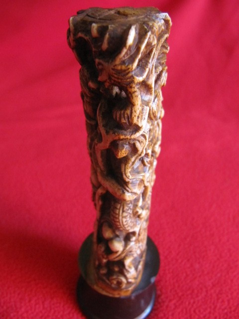 Chinese bone sculpture on blackened wooden base late 19th