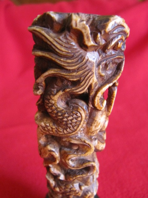 Chinese bone sculpture on blackened wooden base late 19th