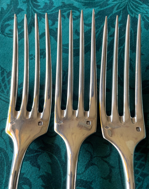 3 set di posate in argento massiccio.