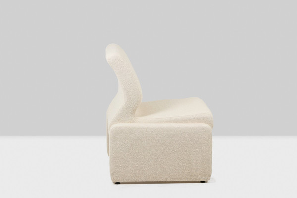 Pair of white bouclé low chairs, 1970s