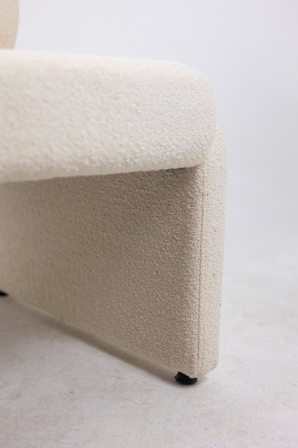 Pair of white bouclé low chairs, 1970s