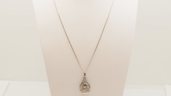 Art Deco Pendant In Platinum, White Gold And Diamonds