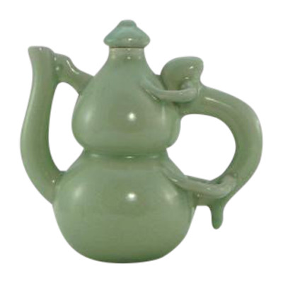 China, Mid-20th Century, Celadon porcelain teapot, two-lobed form.