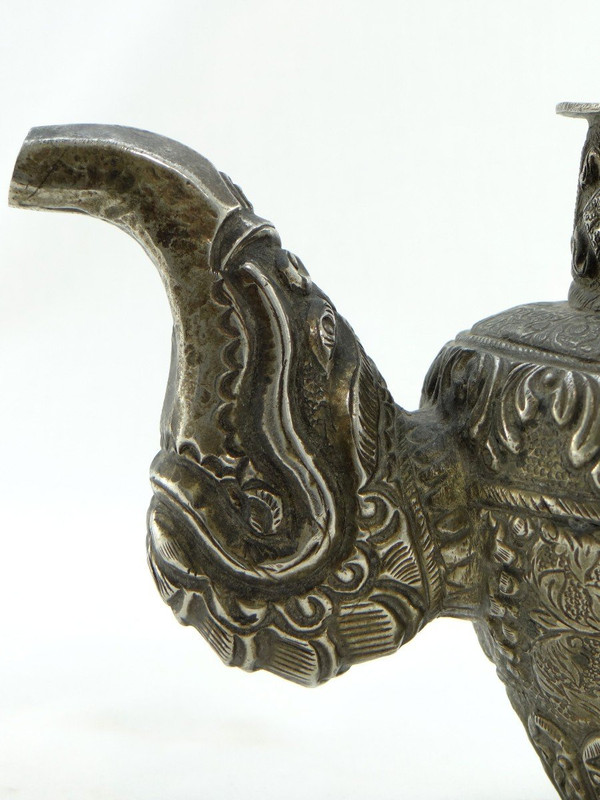 Tibet, Early 20th Century, Repoussé Silver Teapot.
