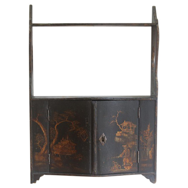 Parisian varnish shelf with black background circa 1760.