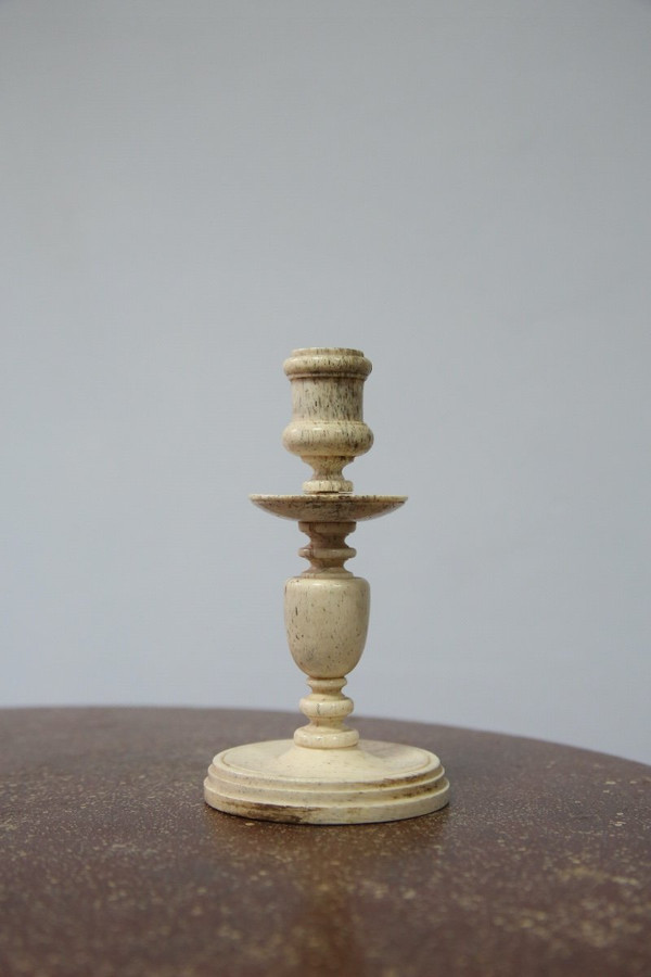 Pair of small turned bone candlesticks, 19th century