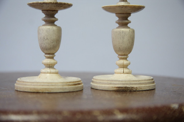 Pair of small turned bone candlesticks, 19th century
