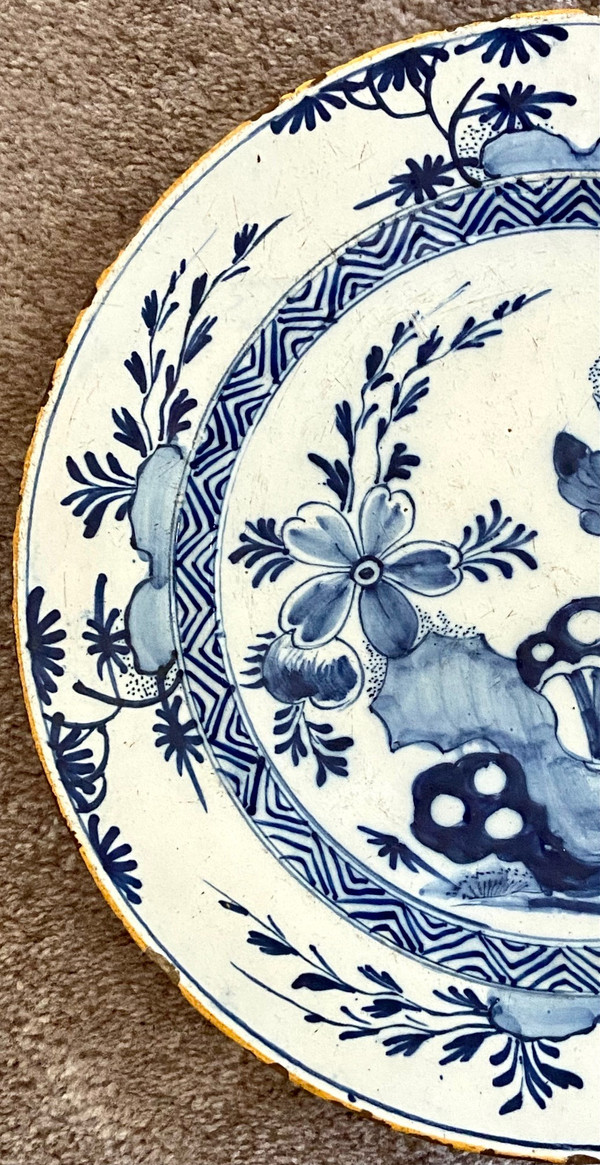Delft, XVIIIth Century, Earthenware Dish Decorated With A Flowery Rock.