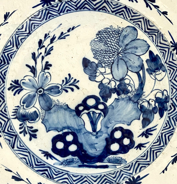 Delft, XVIIIth Century, Earthenware Dish Decorated With A Flowery Rock.