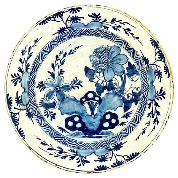 Delft, XVIIIth Century, Earthenware Dish Decorated With A Flowery Rock.