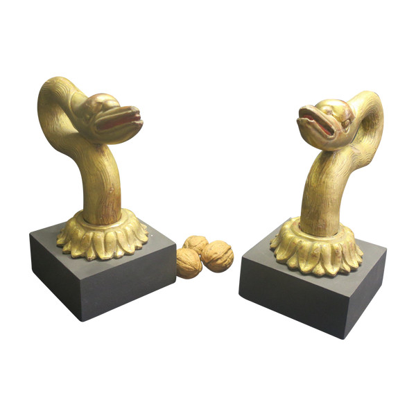 Two swan heads in gilded wood