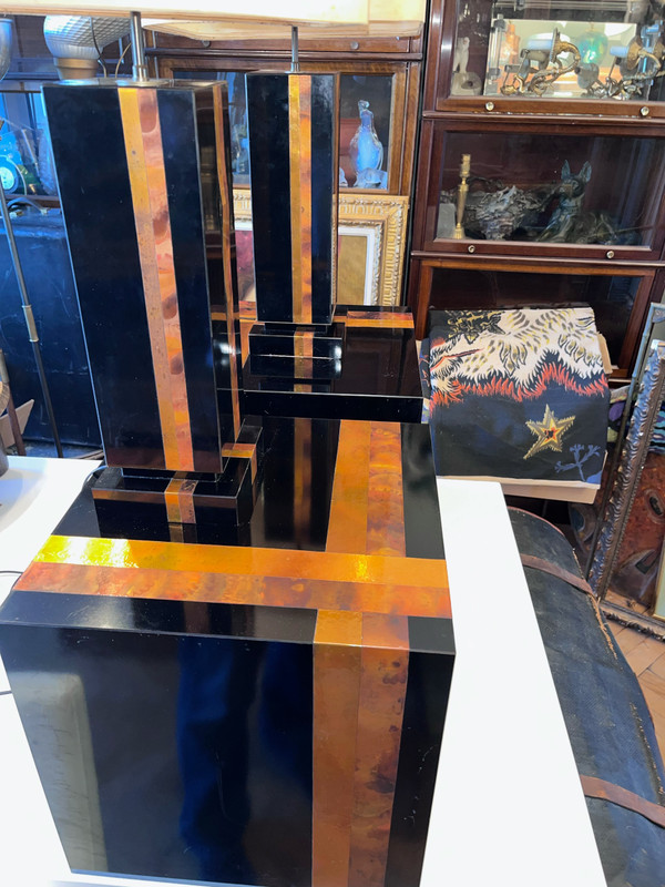 France, Circa 1970. Side tables & lamps set in lacquered wood and copper slats