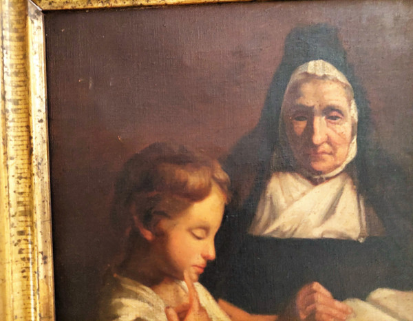 Tableau huile sur toile scène d'une religieuse donnant une leçon de catéchisme à un enfant