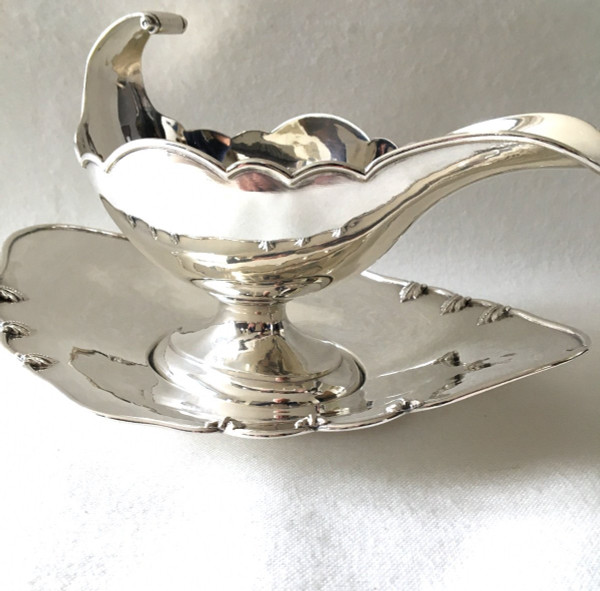 Silver sauceboat in the shape of a shuttle, 19th century