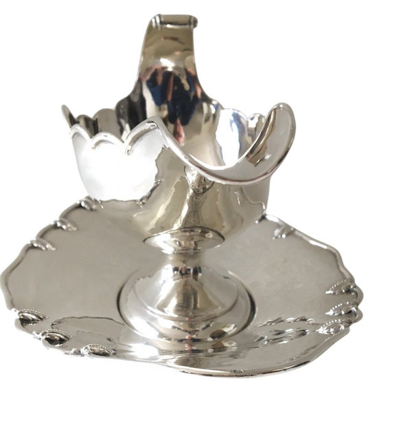 Silver sauceboat in the shape of a shuttle, 19th century
