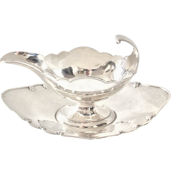 Silver sauceboat in the shape of a shuttle, 19th century