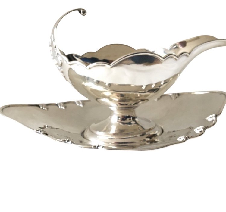 Silver sauceboat in the shape of a shuttle, 19th century