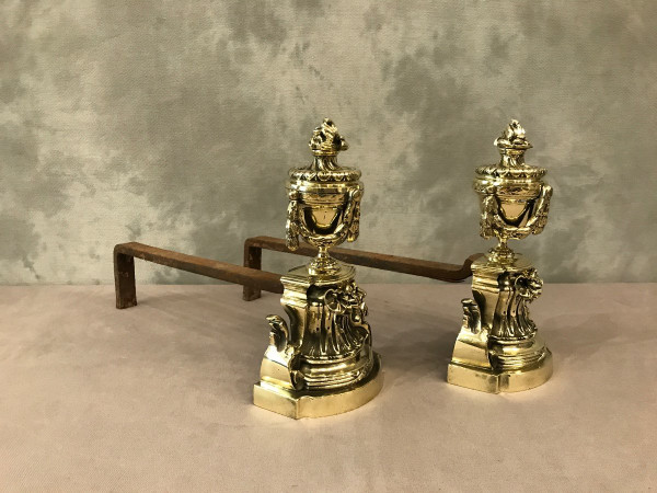 Pair Of Antique Louis XVI Style Polished Bronze Andirons From The 19th Century