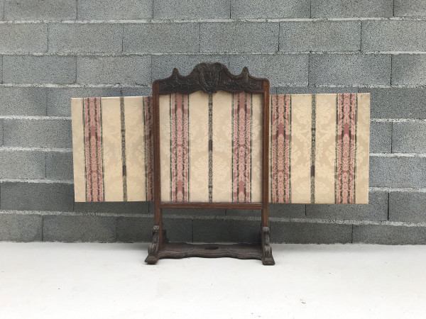 Carved wooden fireplace screen from the late 18th century