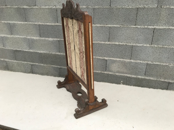Carved wooden fireplace screen from the late 18th century