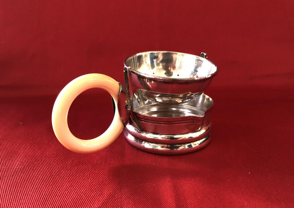 Rocking tea strainer in hallmarked solid silver, ivory handle, late 19th century.