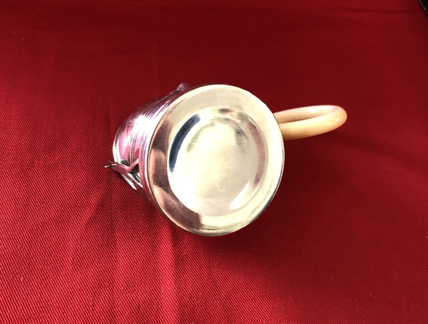 Rocking tea strainer in hallmarked solid silver, ivory handle, late 19th century.