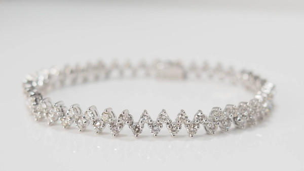 Bracciale River in oro bianco e diamanti