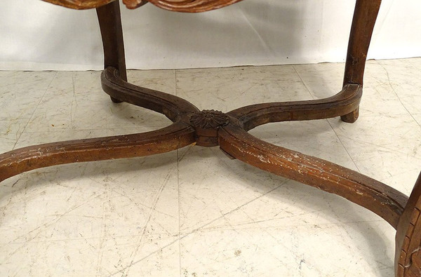 Poltrona Regency in canna di faggio intagliata con conchiglie fogliate XVIII secolo