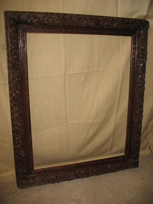 Large early 19th century carved oak frame in the Louis XIII style