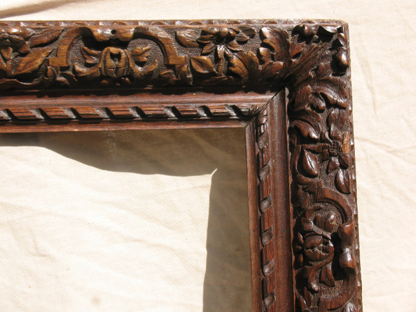 Large early 19th century carved oak frame in the Louis XIII style