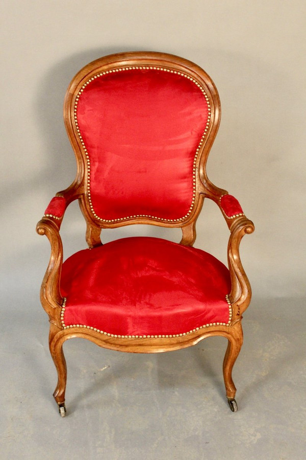 Poltrona Luigi Filippo in noce del XIX secolo