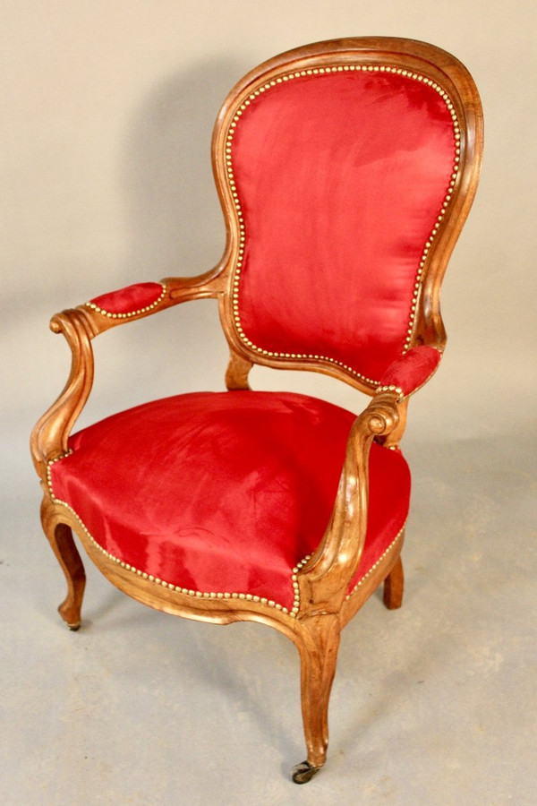 Poltrona Luigi Filippo in noce del XIX secolo