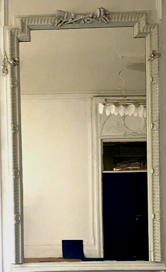 Louis XVI style mirror in wood and carved stucco XX century
