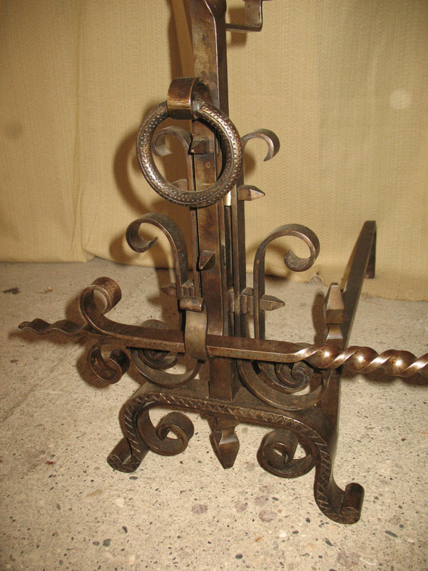 Pair of wrought-iron andirons complete with shovel, tongs and bar, 20th century