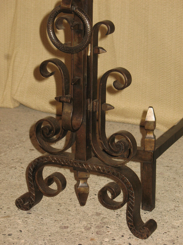 Pair of wrought-iron andirons complete with shovel, tongs and bar, 20th century